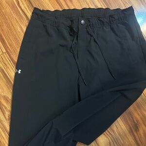 Under Armour track pants with cinched ankles.